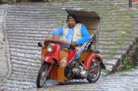 Man on motorbike in Gjirokastër, Albania
